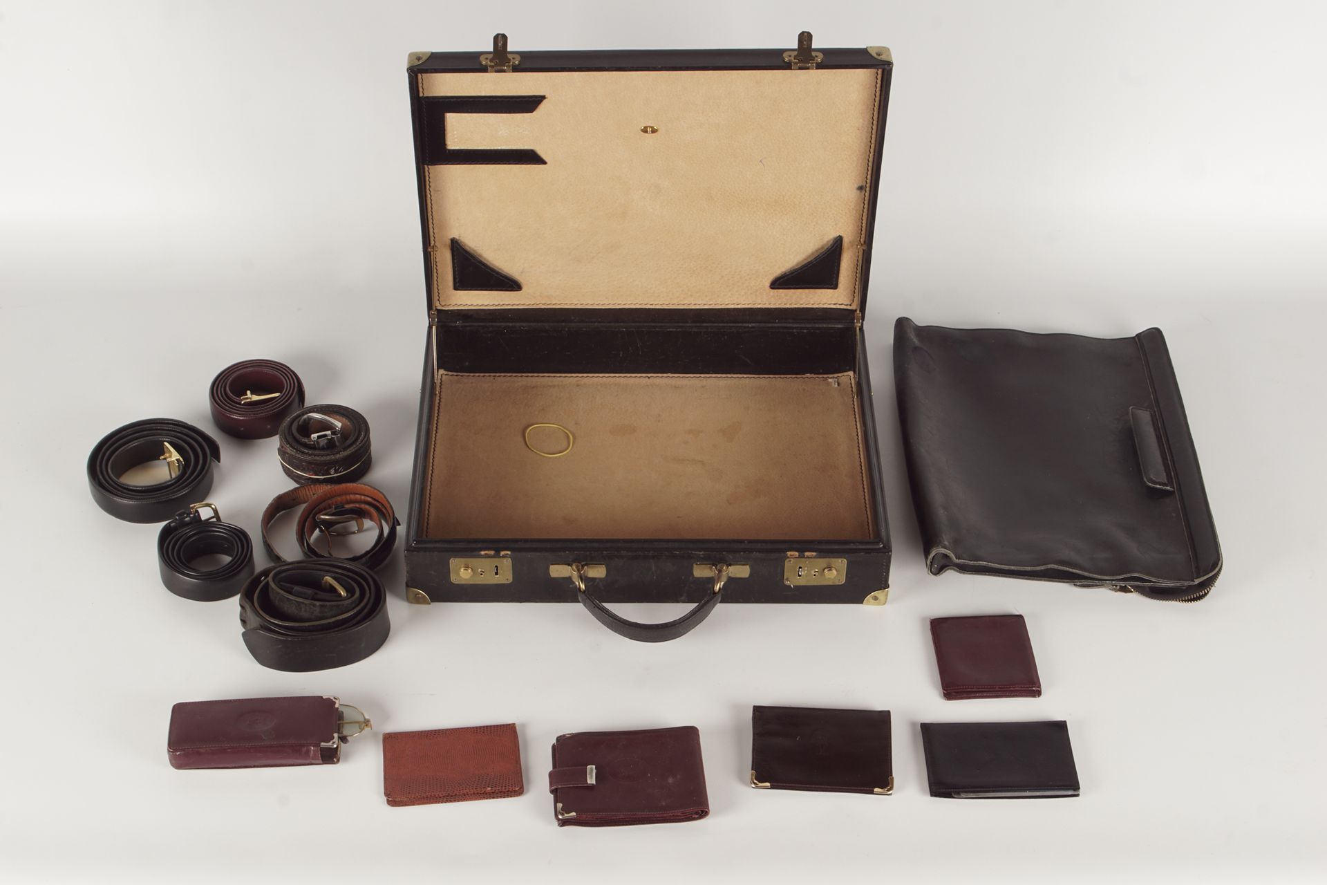 Maroquinerie dont DELVAUX A set of leather goods including a Delvaux briefcase, &hellip;