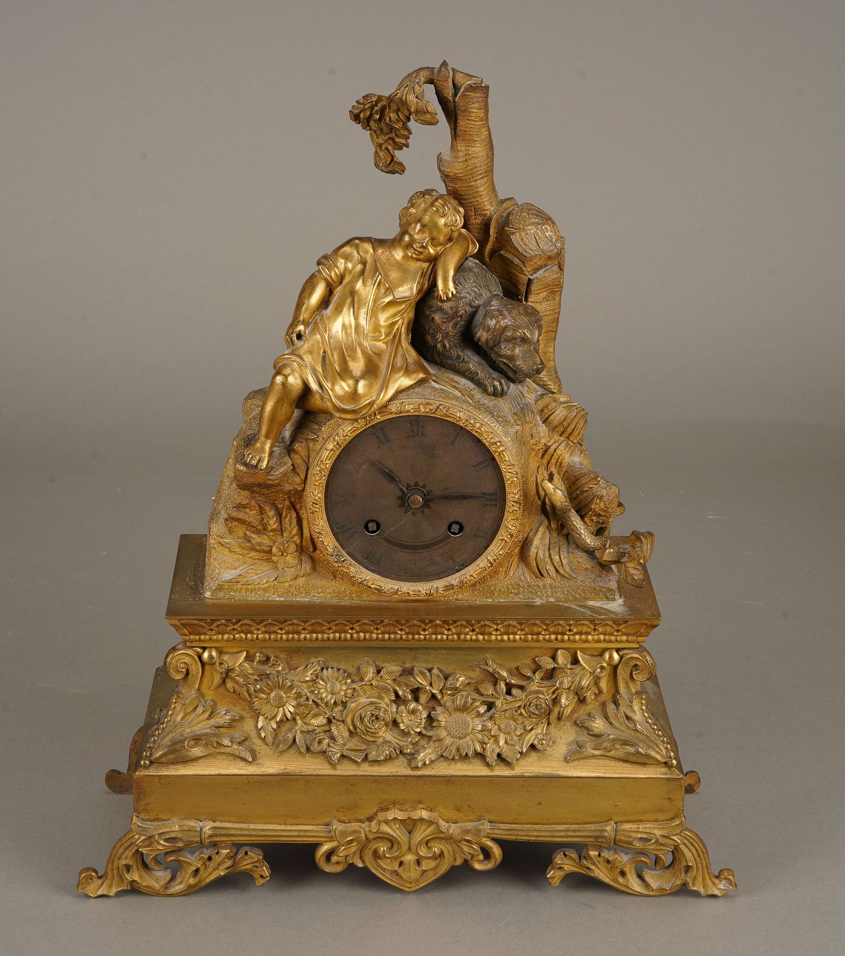 Horloge Pendule à décor de sous bois à l'enfant et au serpent, bronze doré, H +-&hellip;
