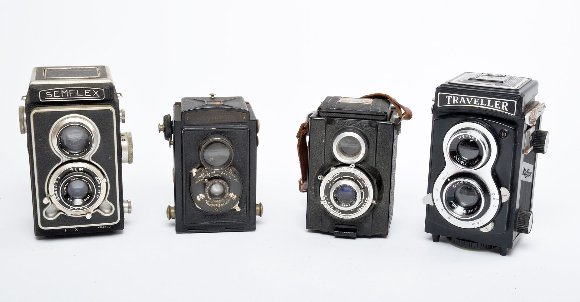 Null 4 appareils photos Bi-Objectifs : Semflex avec objectif Berthiot , Travelle&hellip;