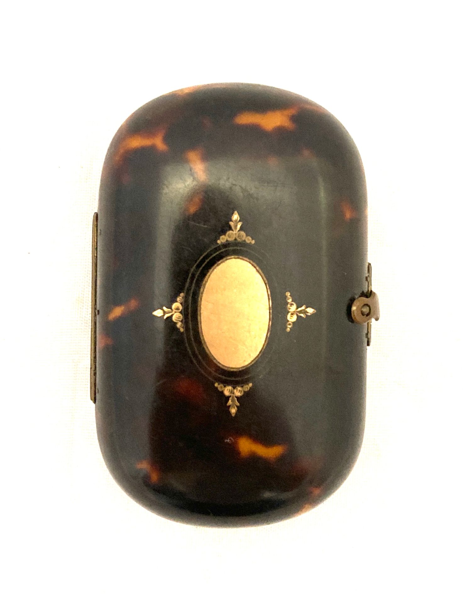 Null Oval tortoiseshell louis door with a blind cartouche design in gold inlay. &hellip;