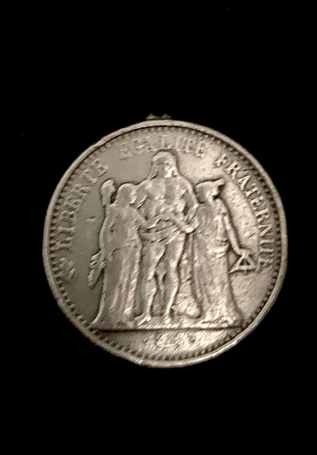 Null Pièce en argent de 10 francs. Poids de 24,6 g. Très usée.