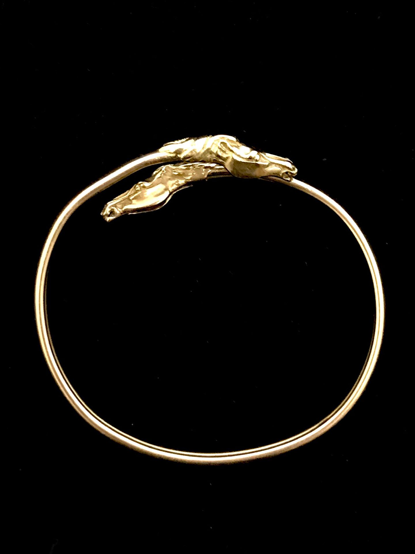 Null Bracelet in 18k yellow gold 750°/00, finished with two horse heads. Inside &hellip;