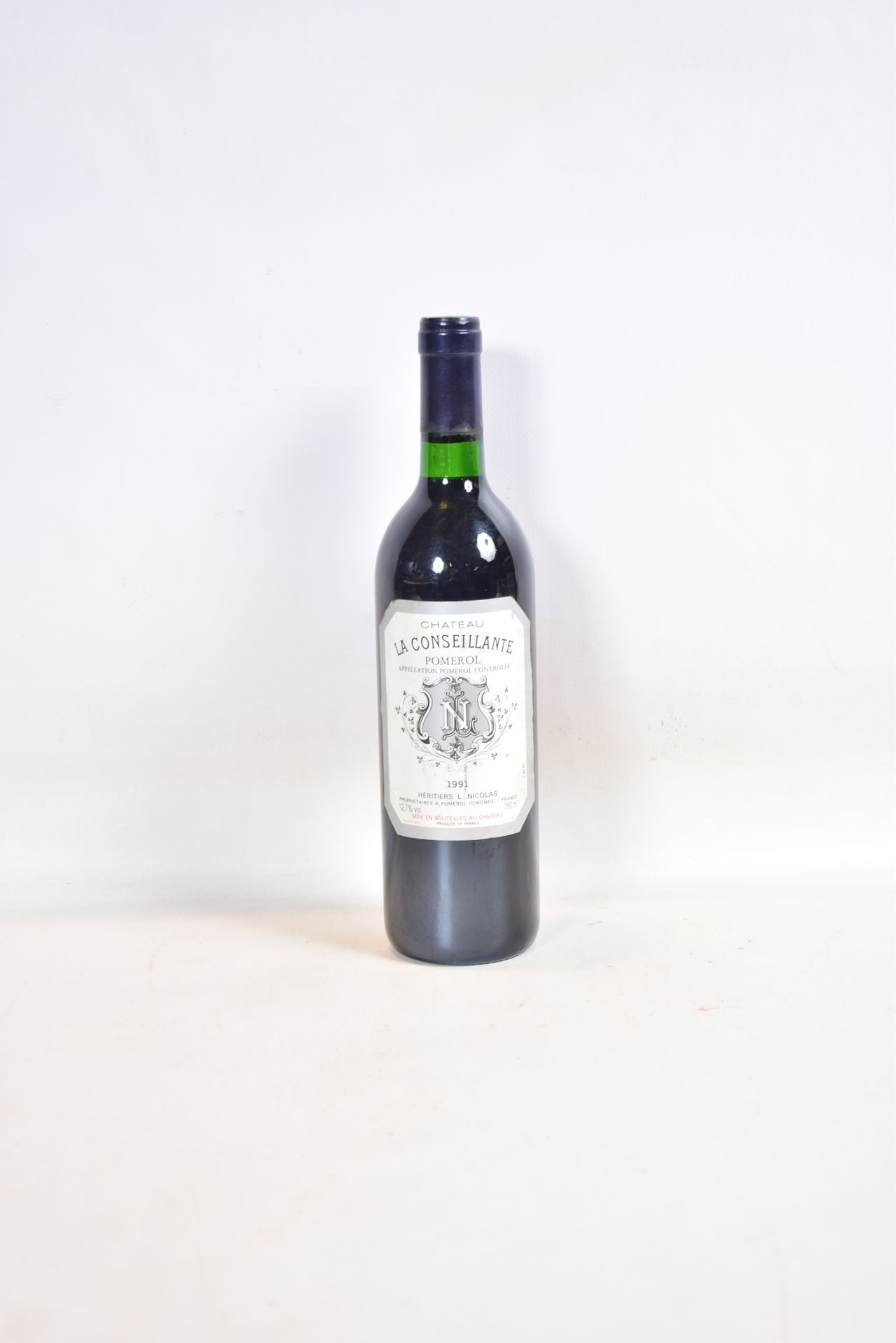 Null 1 Blle CH. LA CONSEILLANTE Pomerol 1991

	Stained et. N: low neck.