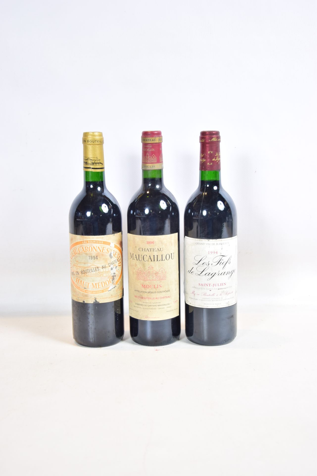 Null Lot de 3 blles comprenant :		

1 Blle	CH. MAUCAILLOU	Moulis	1996

1 Blle	CH&hellip;