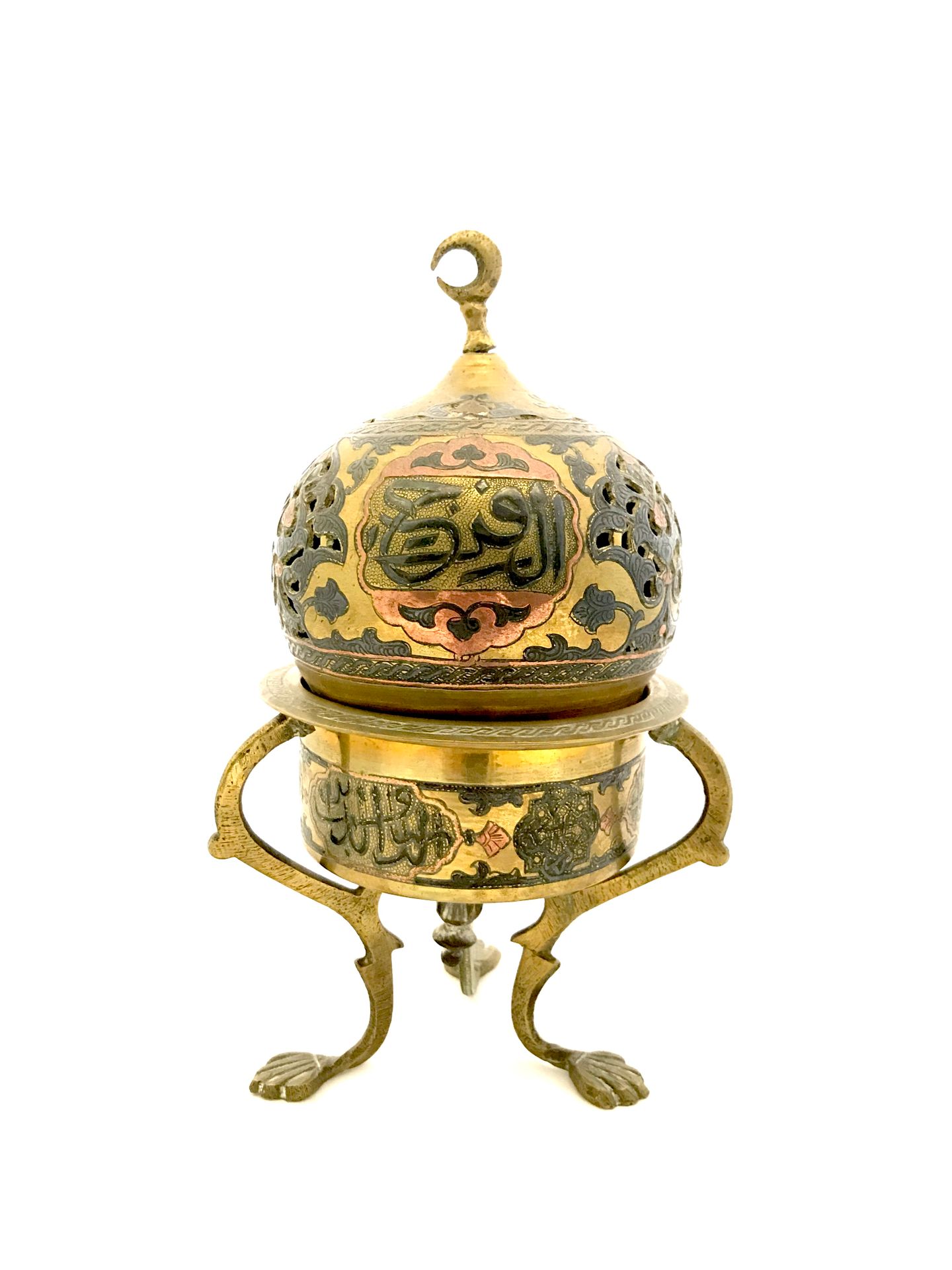 Null 一个奥斯曼帝国的乌木耳黄铜和铜制三脚架香炉，19世纪末。高25厘米。