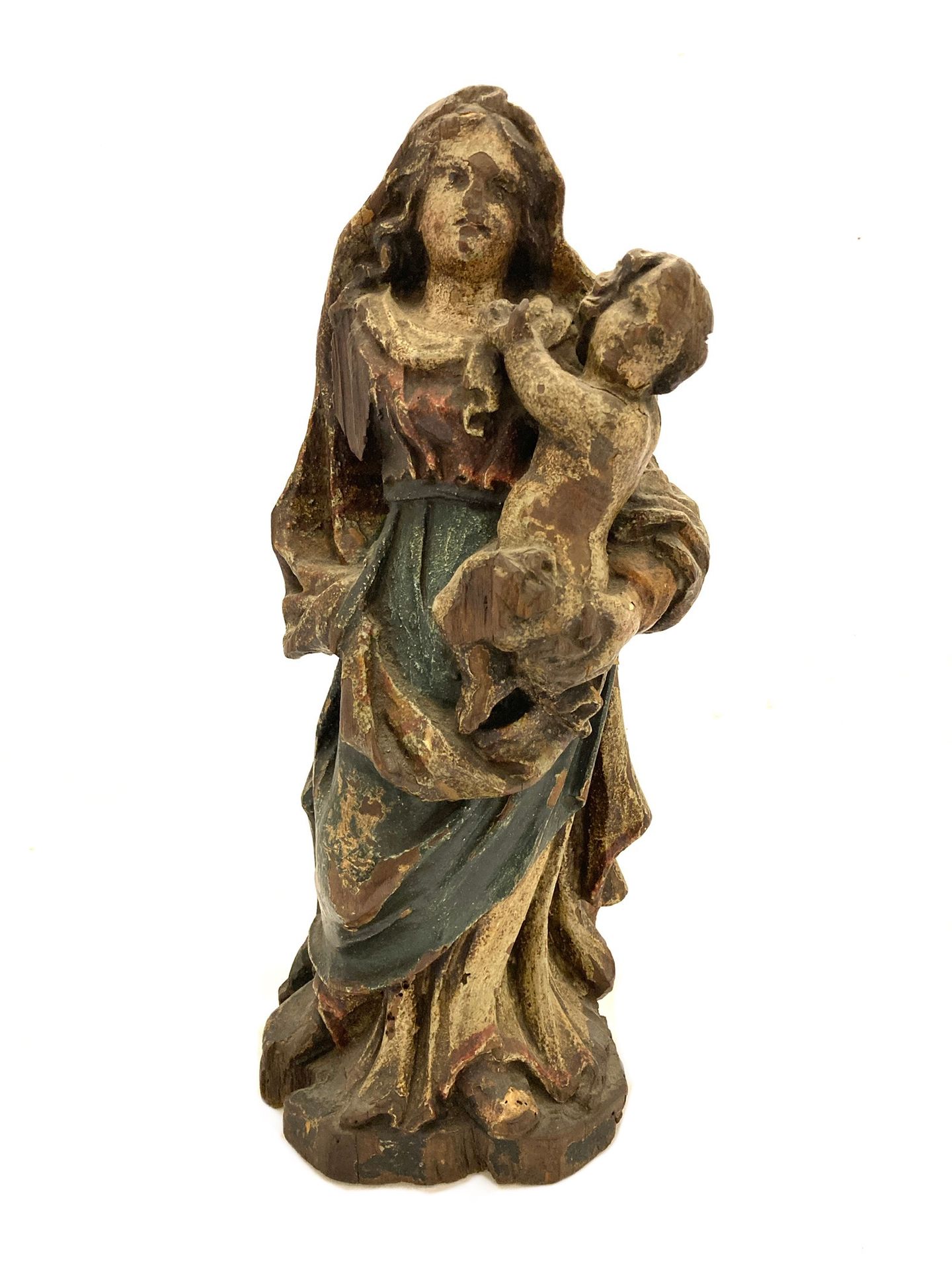Null 
Virgin and child in polychrome wood. 18th century. Height : 37,4 cm. Misse&hellip;