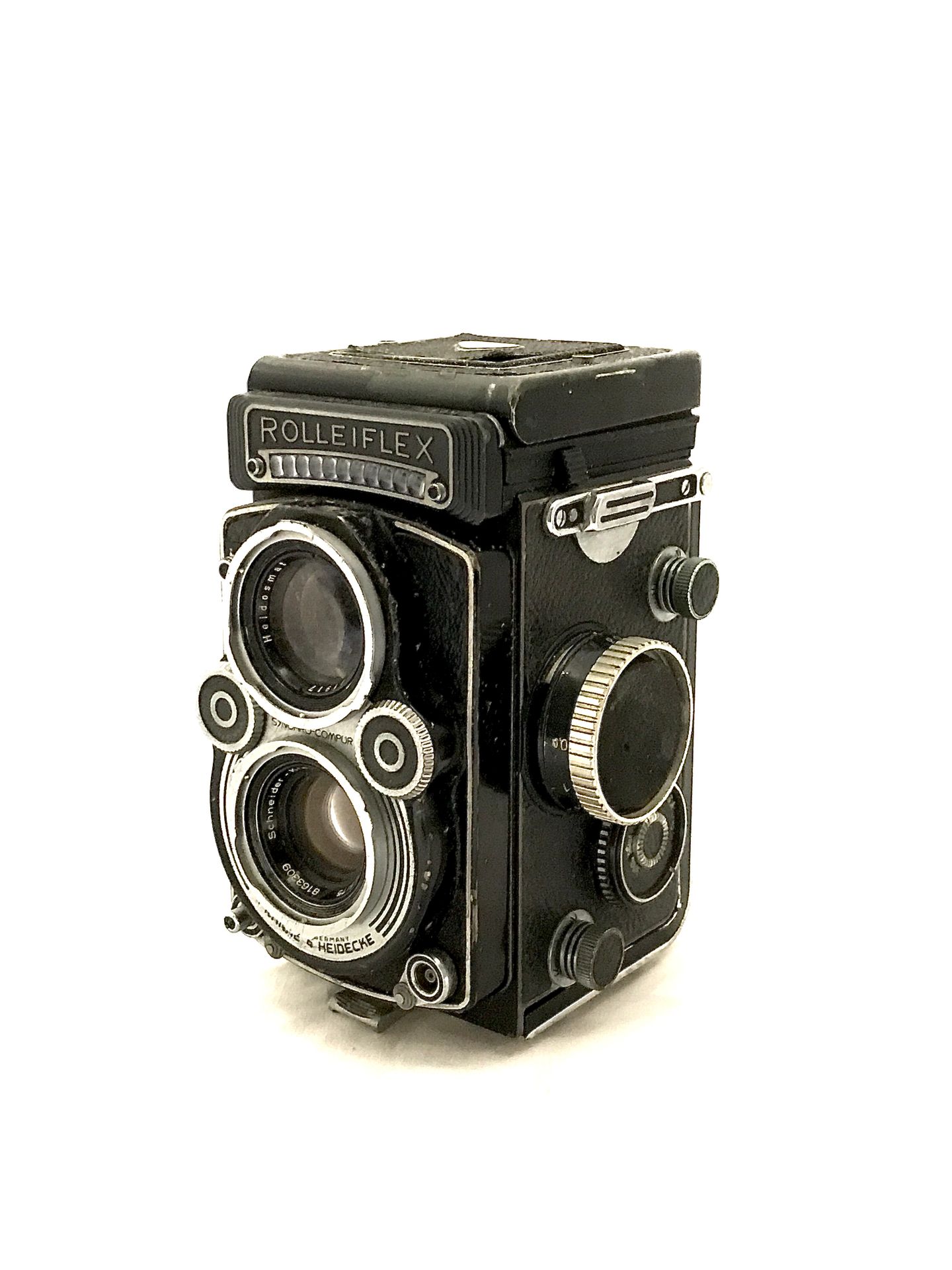 Null 
ROLLEIFLEX，黑色漆面金属摄像机，1 : 2.8 / 75。漆面跳动和磨损。高14.5厘米。宽度为9厘米。深度为10厘米。