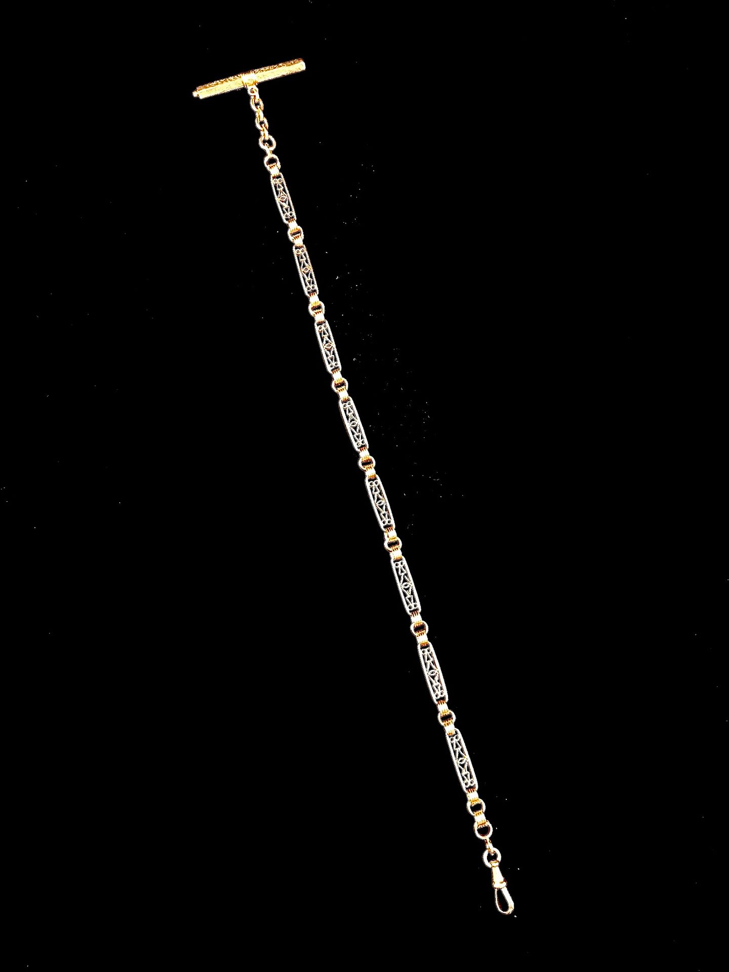 Null Chaîne giletière en or rose 18K (750°/00) composée de maillons ovales alter&hellip;