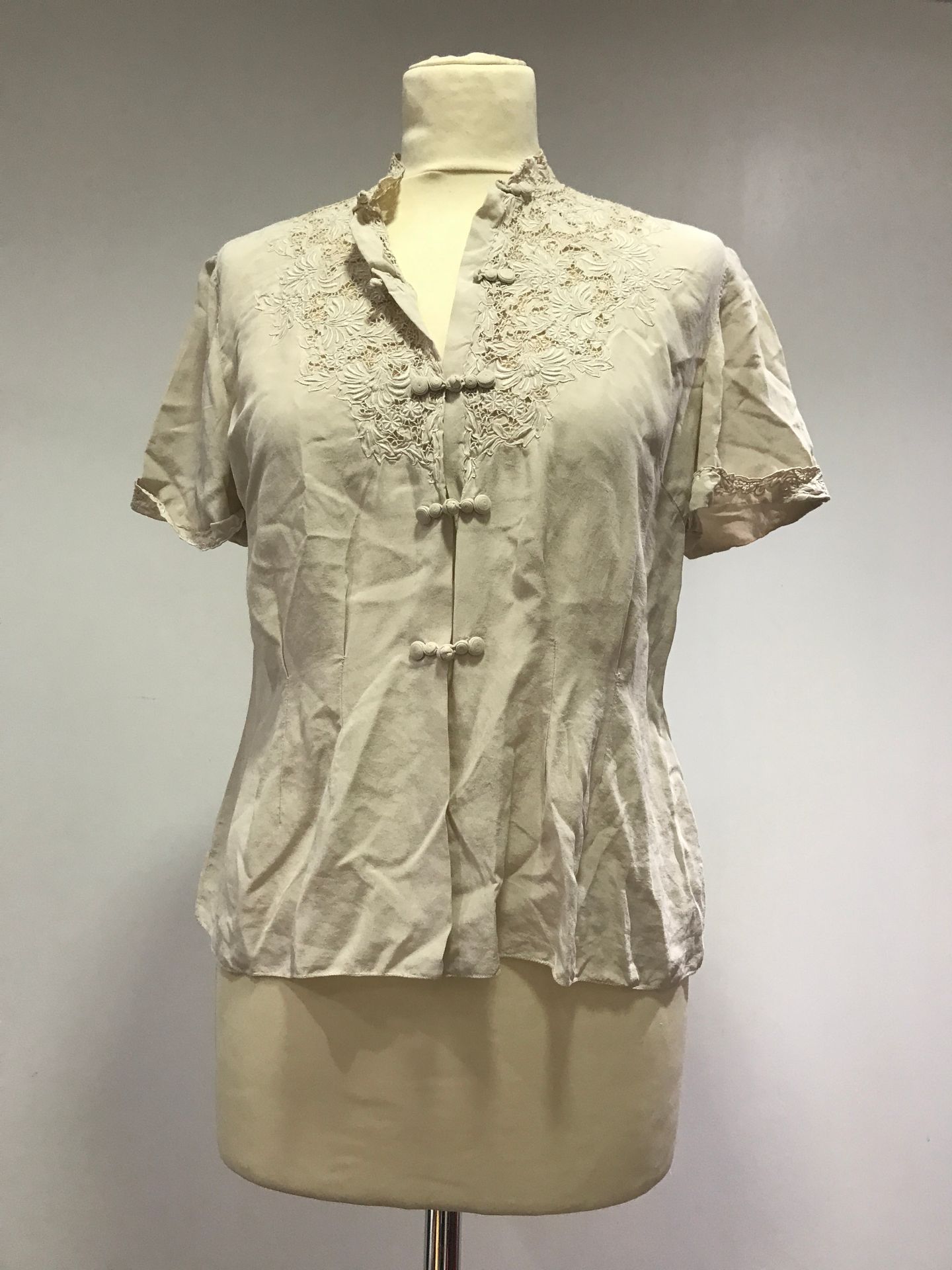 Null Short-sleeved blouse in coffee-colored silk crepe, openwork and decorated w&hellip;