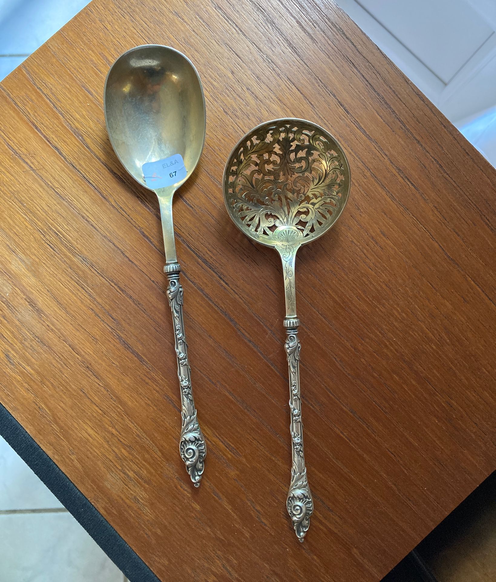 Null A silver spoon and a sprinkler spoon 950°/00, one with a pierced vermeil sp&hellip;