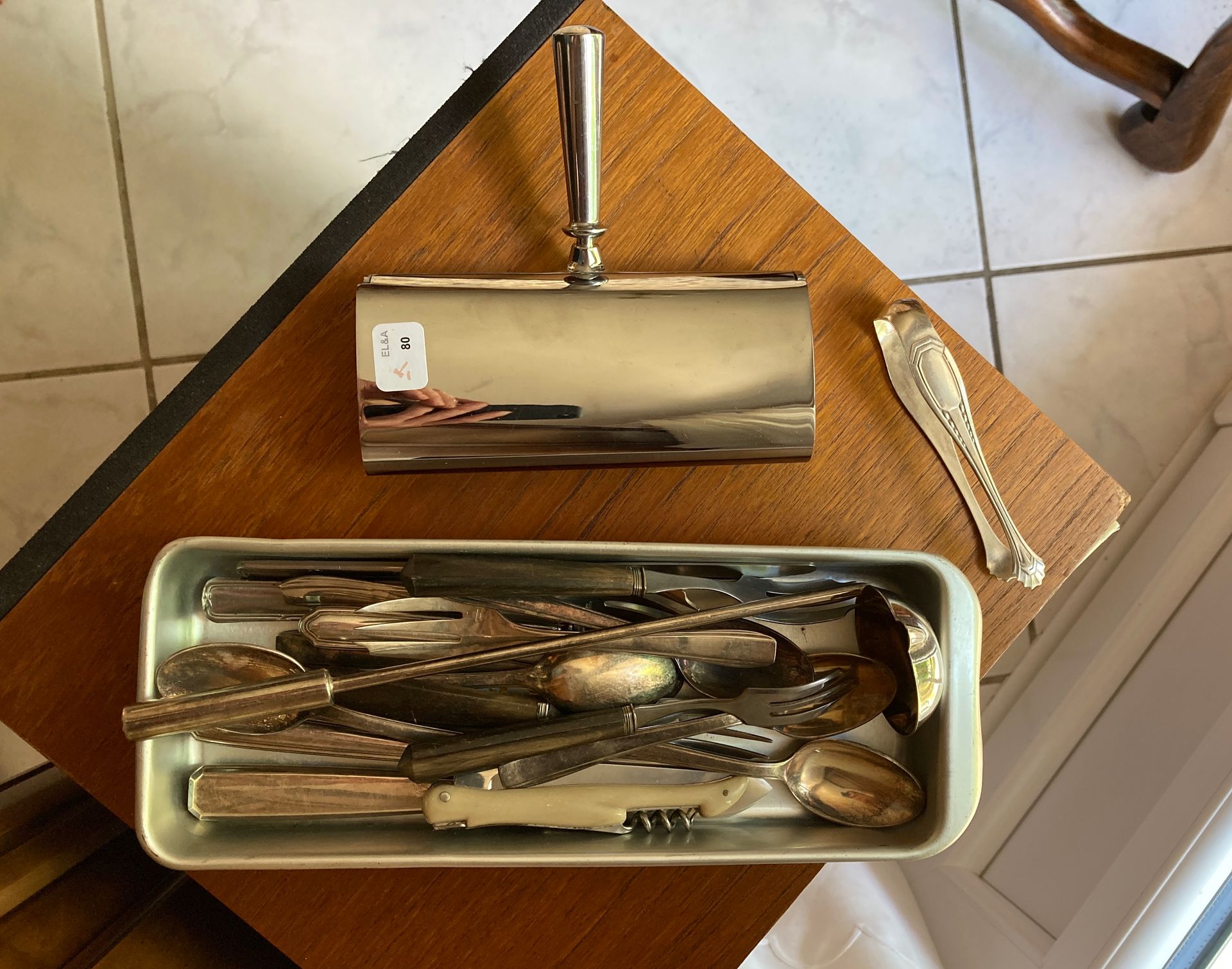Null A miscellaneous lot including spoons, forks, corkscrews, sugar tongs, crumb&hellip;