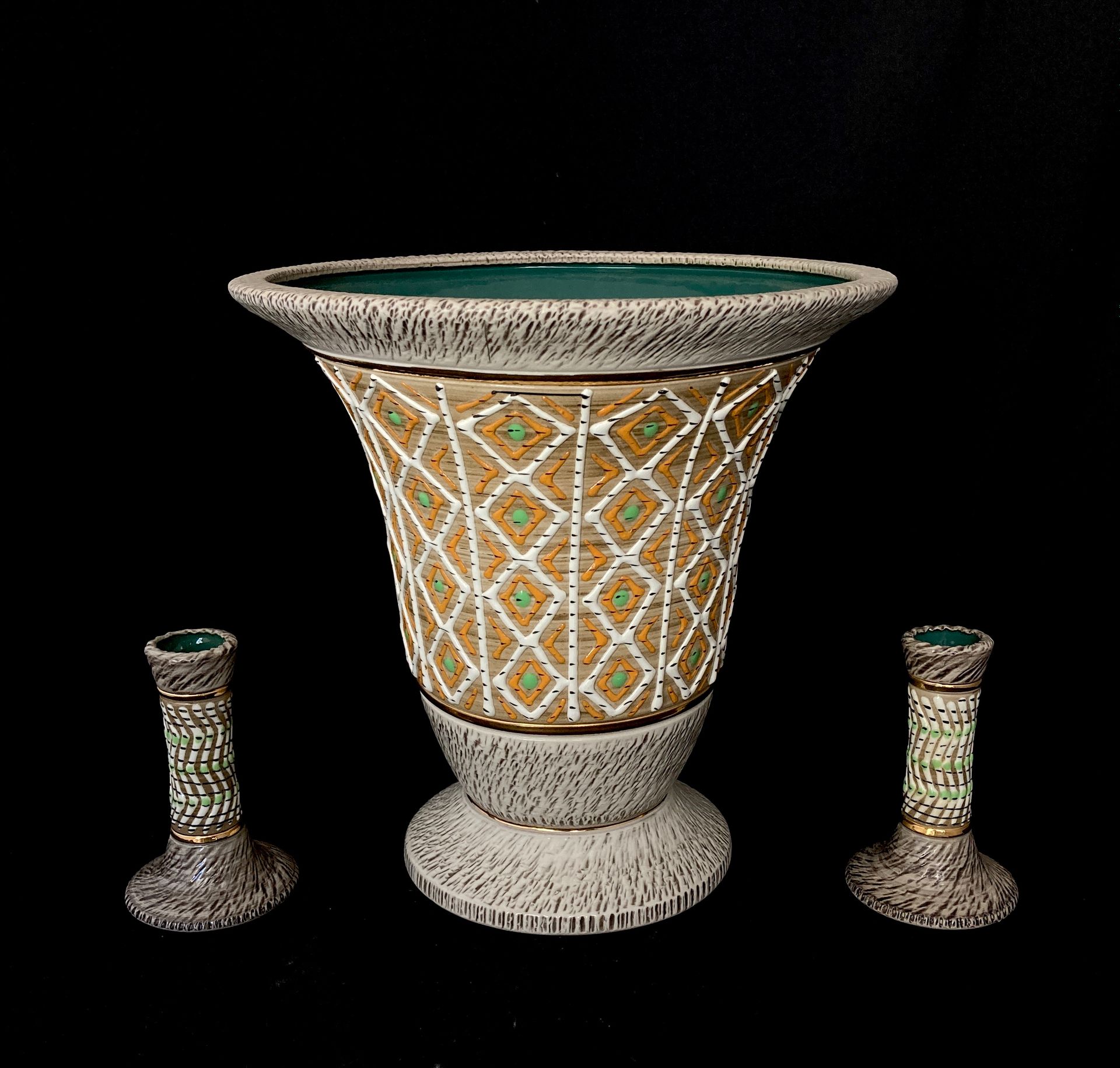 Null J. BREUGNOT (XXe siècle)

Vase et paire de flambeaux en céramique émaillée &hellip;