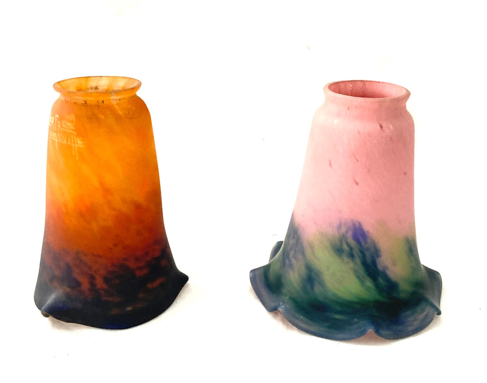 Null Suite of three corollas of blown glass luminaries. 

One signed "Muller fre&hellip;