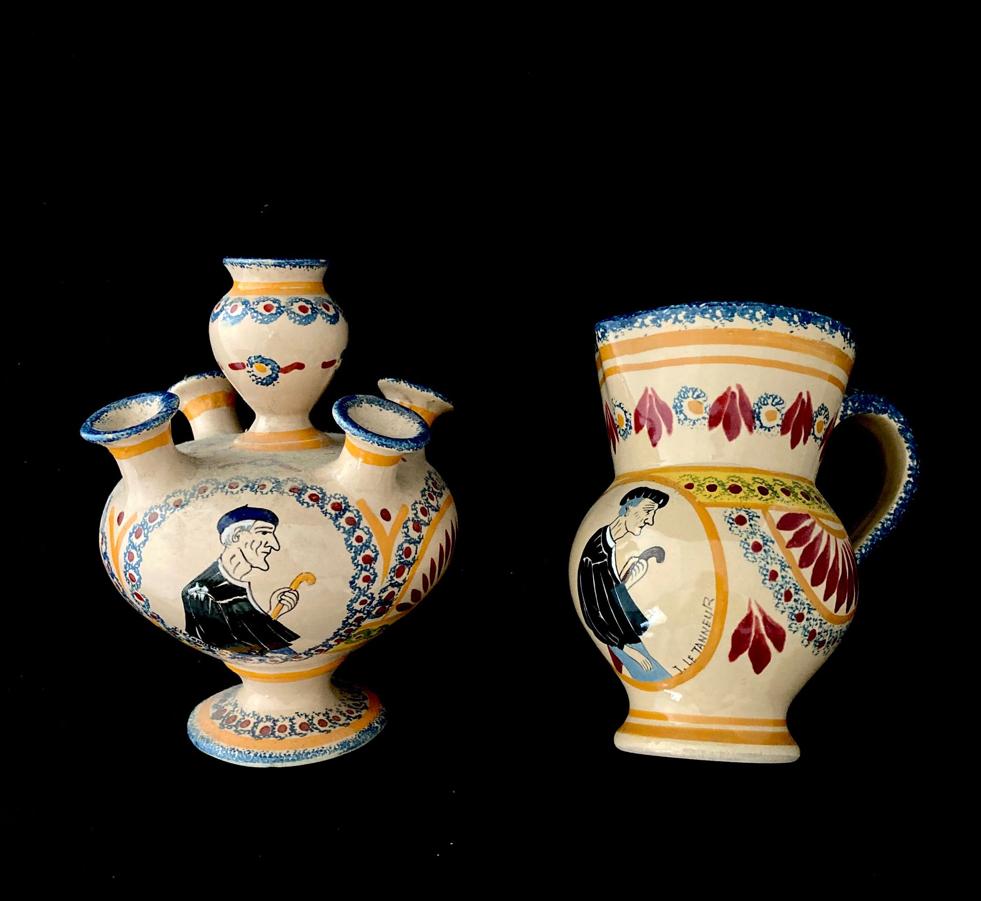 Null Le TANNEUR 1887-1935, ARCACHON

一个多色珐琅彩陶器的壶和一个花瓶，上面装饰着男人的轮廓图。

签名。

高度为15和1&hellip;