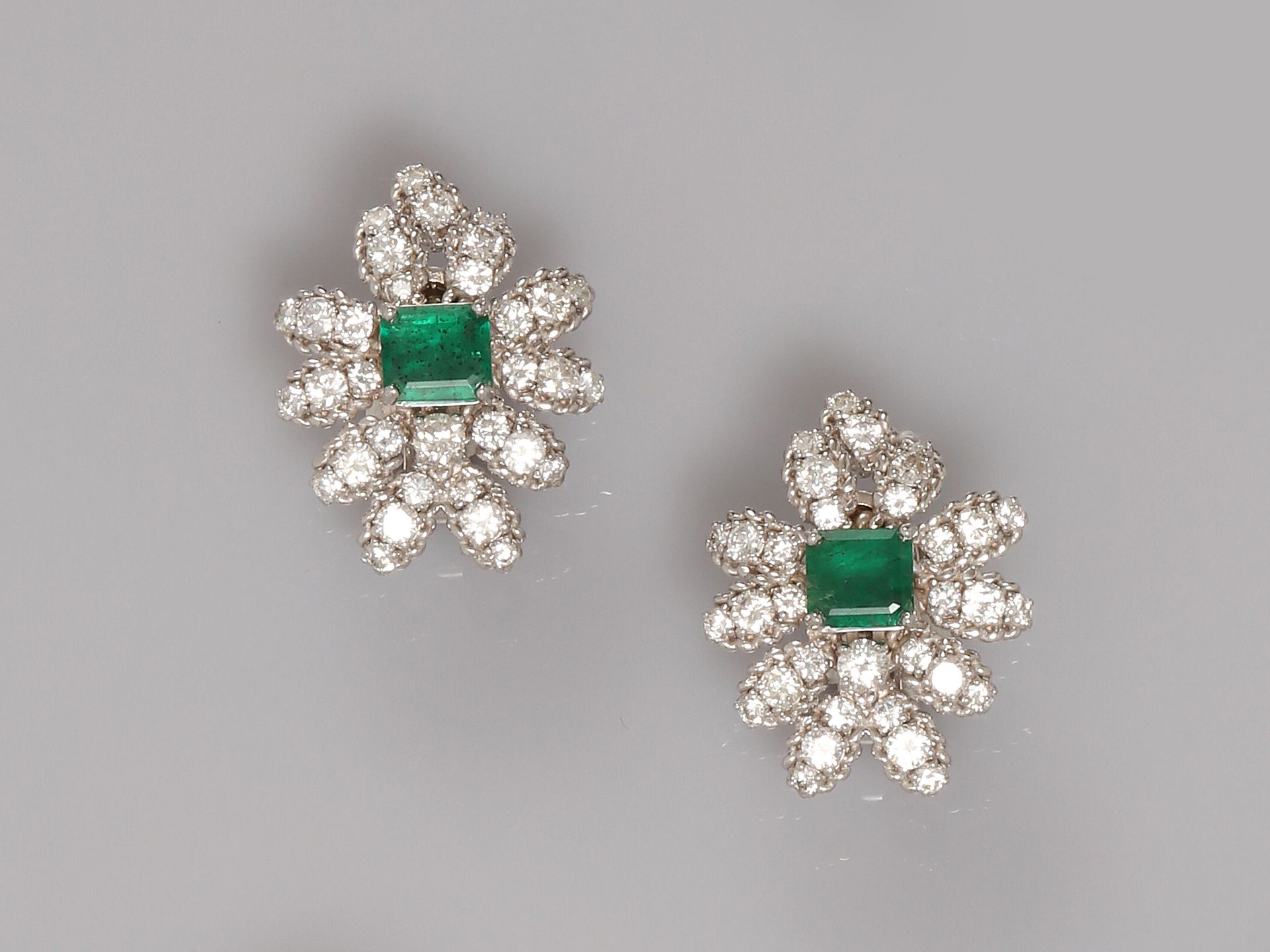 Null Gold flower ear clips, 750 MM, each with a square cut emerald weighing abou&hellip;