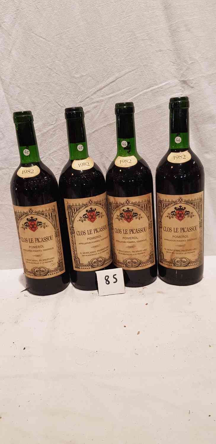 Null 4 bottles CLOS LE PICASSOU. POMEROL. 1982. Stained labels, 1 high shoulder.