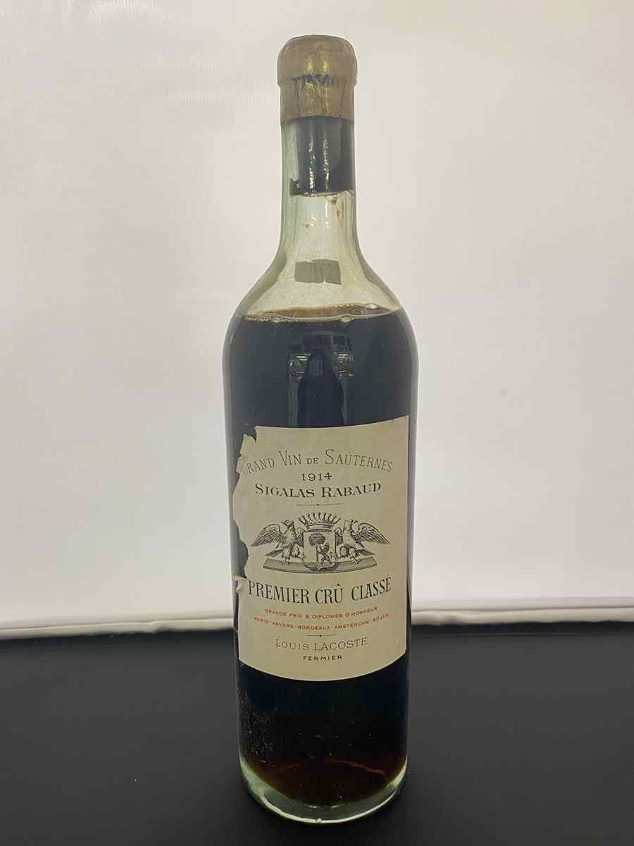 Null 1 Bottle château SIGALAS RABAUD 1914 SAUTERNES. Torn label, mid-shoulder le&hellip;