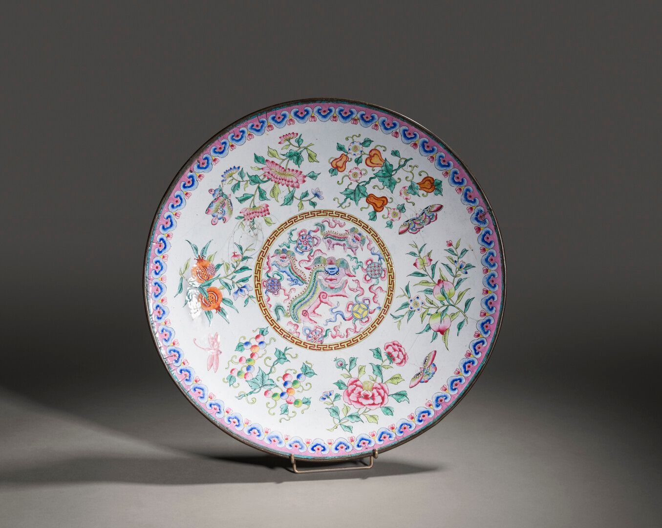 Null Large enamelled copper offering dish with polychrome decoration on a white &hellip;