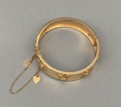 Null Bracelet rigide articulé en or 18 K (750 °/°°) orné en applique d'idéogramm&hellip;