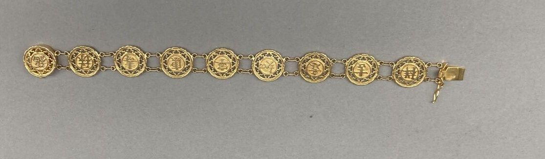 Null Armband aus 14 K Gold (585 °/°°), das eine Reihe von 9 ziselierten Medaillo&hellip;