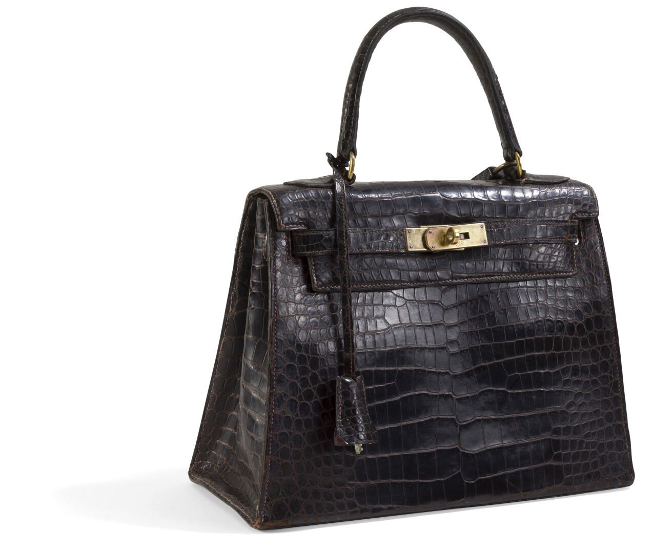 Null HERMES
Handbag, Kelly model, in brown crocodile leather (crocodylus porosus&hellip;