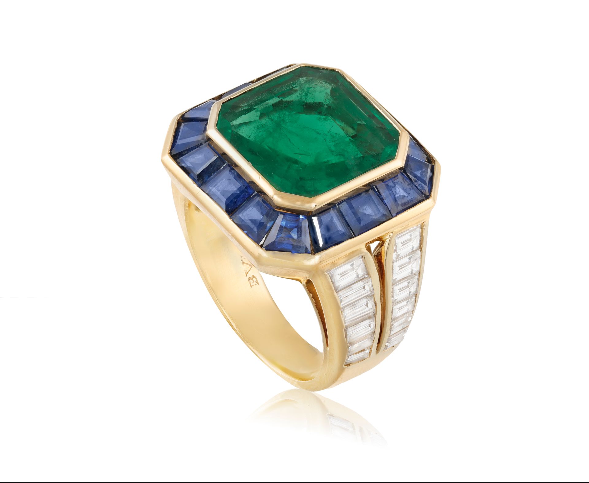 Null AN EMERALD, SAPPHIRE AND DIAMOND RING, BY BULGARI, CIRCA 1980 The collet-se&hellip;