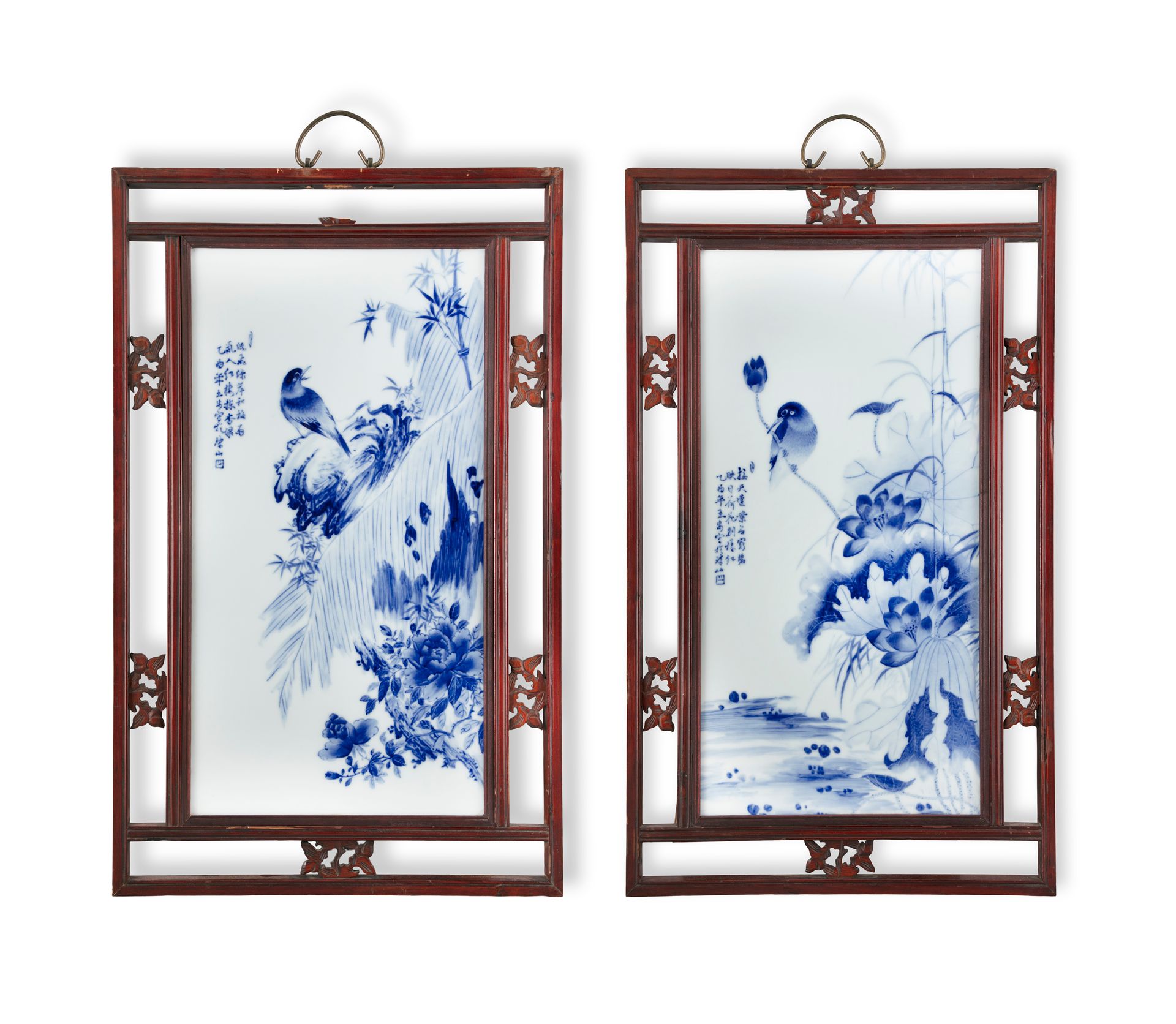 Null A MIRROR PAIR OF ‘SPARROW AND LOTUS’ BLUE AND WHITE PORCELAIN PLAQUES IN TH&hellip;