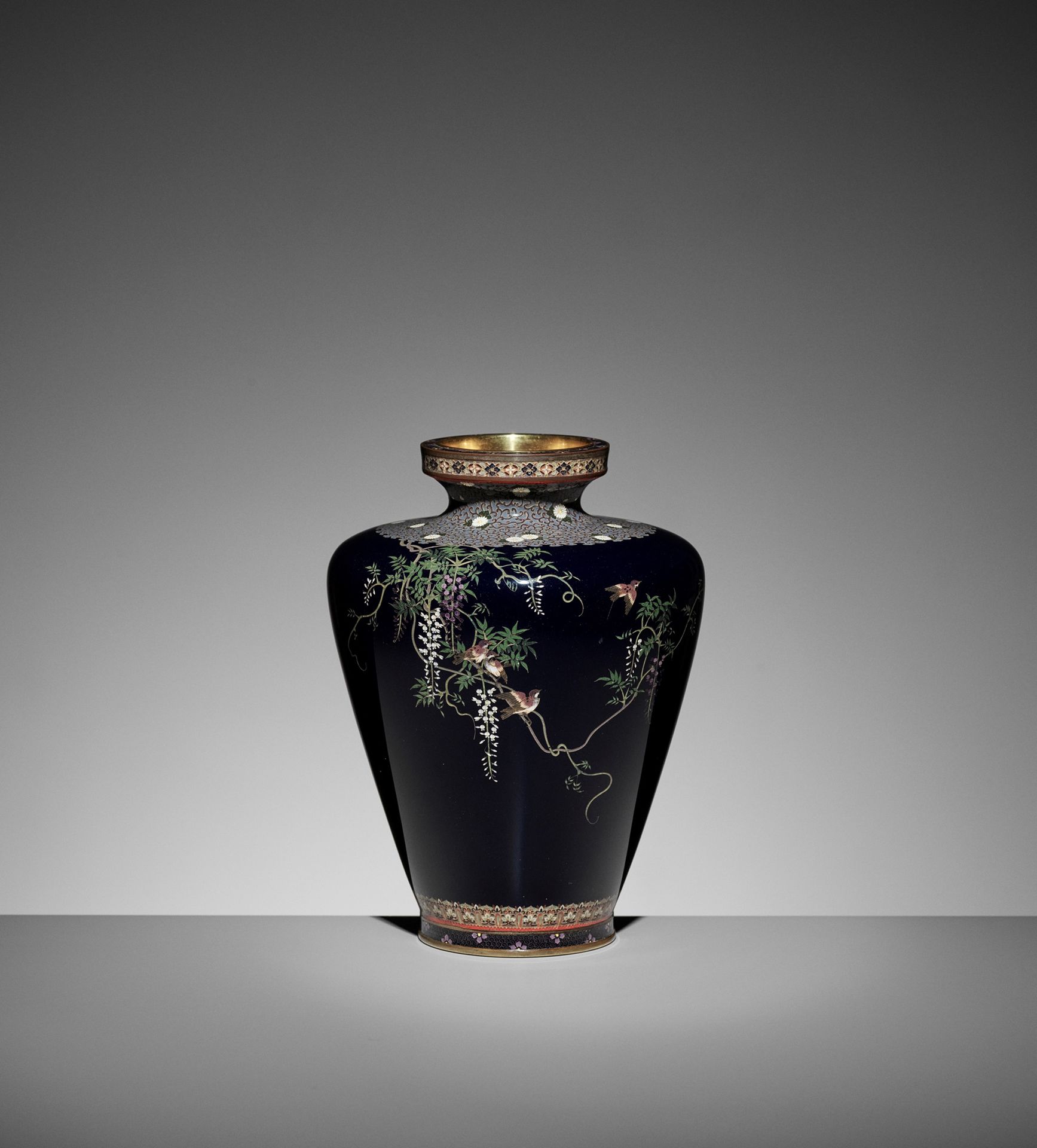 A FINE CLOISONNÉ ENAMEL VASE WITH SPARROWS AND WISTERIA, ATTRIBUTED TO THE WORKS&hellip;