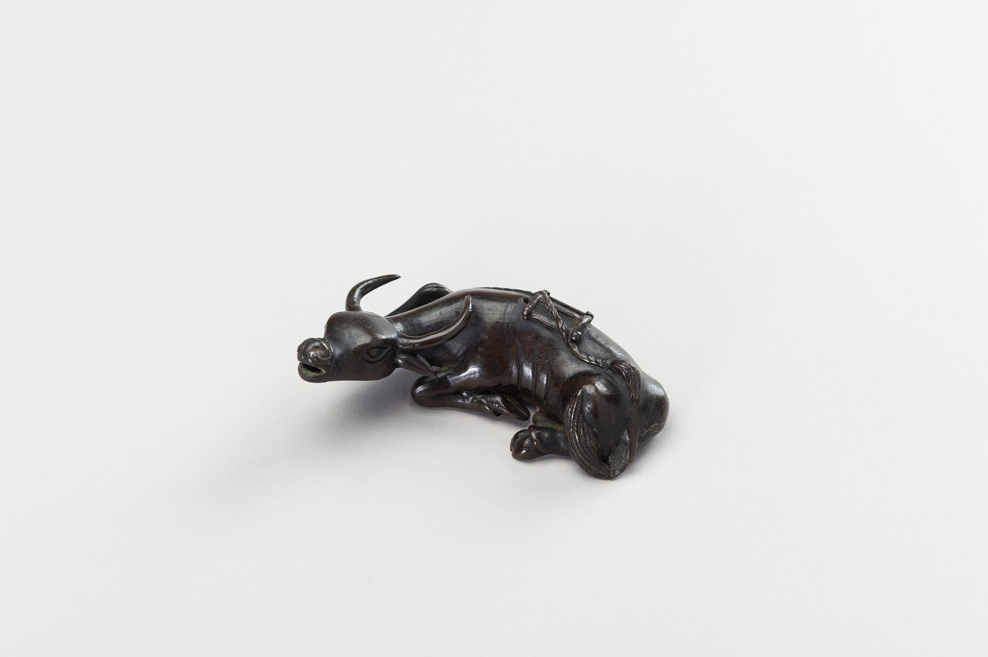 A CHINESE BRONZE FIGURE OF A TAMED WATER BUFFALO A CHINESE BRONZE FIGURE OF A TA&hellip;