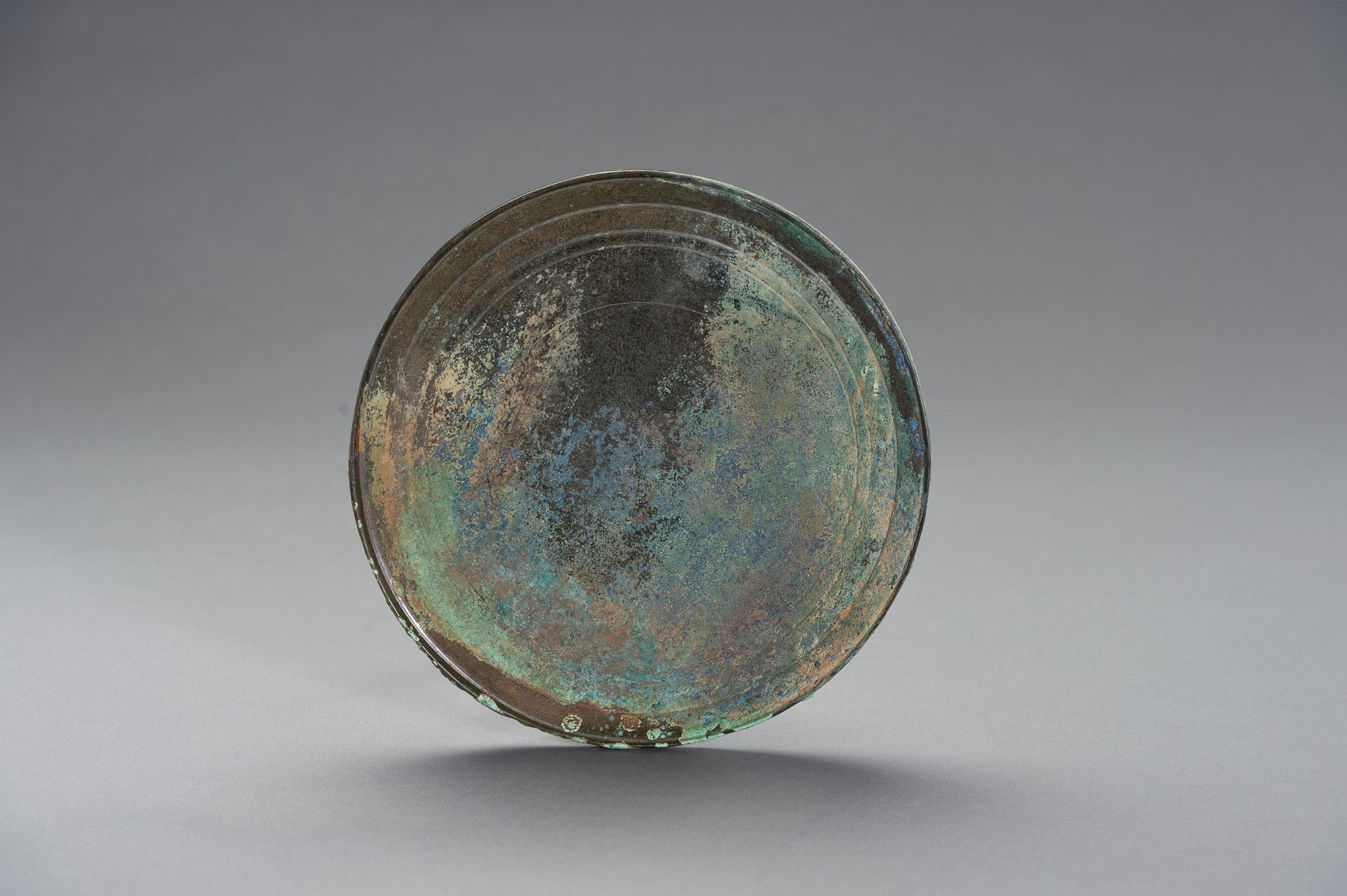 A LARGE BRONZE MIRROR 
大型

青铜镜


Cambodia, Khmer Empire (Angkor culture), ca. 12&hellip;