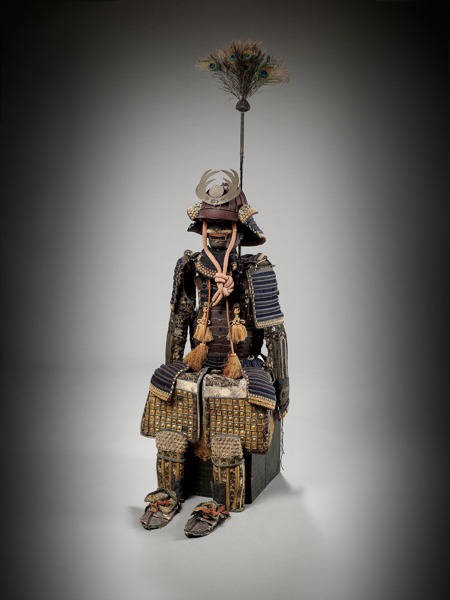 A TOSEI GUSOKU (SUIT OF ARMOR) WITH A PEACOCK-FEATHERED SASHIMONO (STANDARD) UN &hellip;