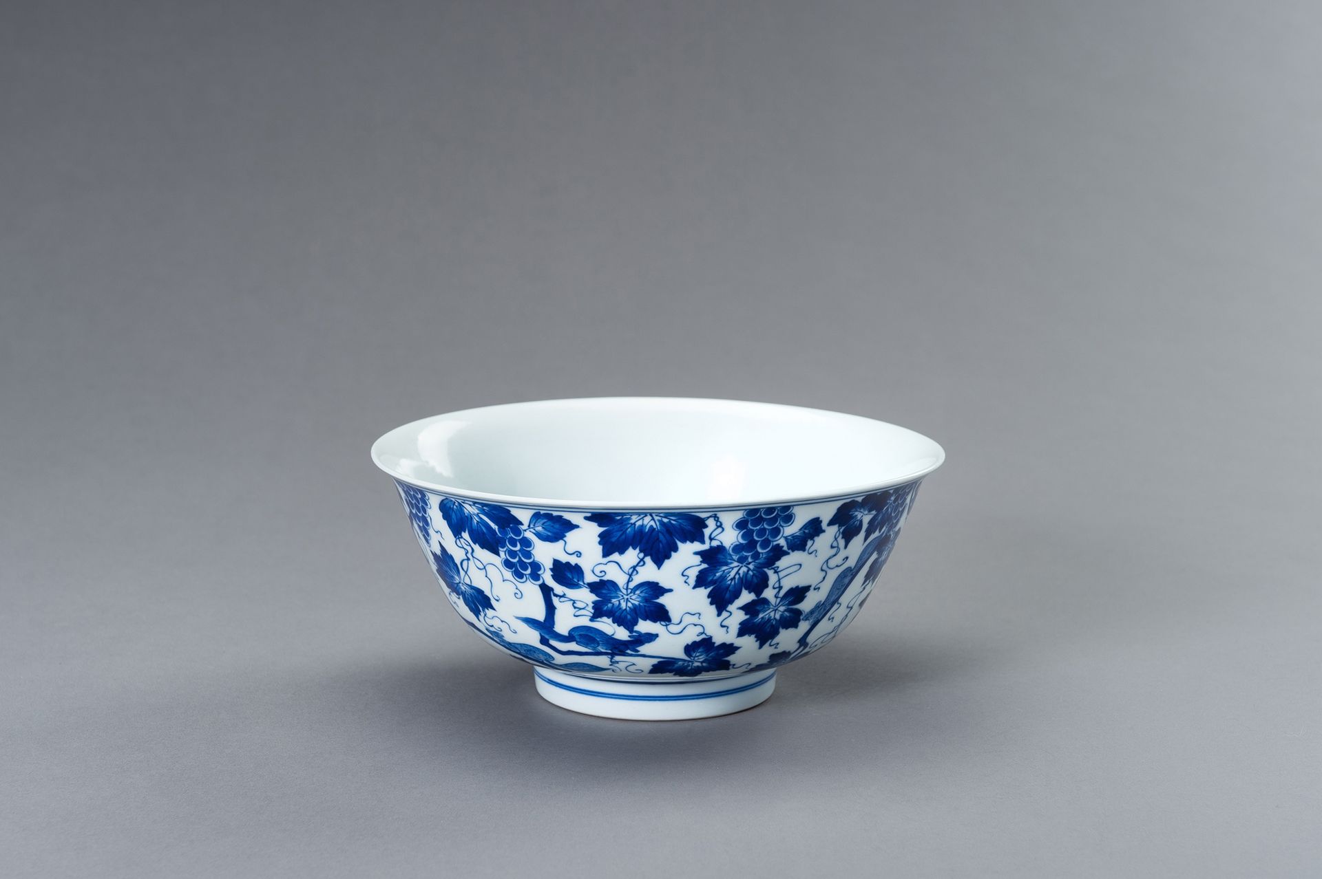 A LARGE BLUE AND WHITE PORCELAIN KANGXI REVIVAL ‘SQUIRREL AND GRAPE’ BOWL GRANDE&hellip;