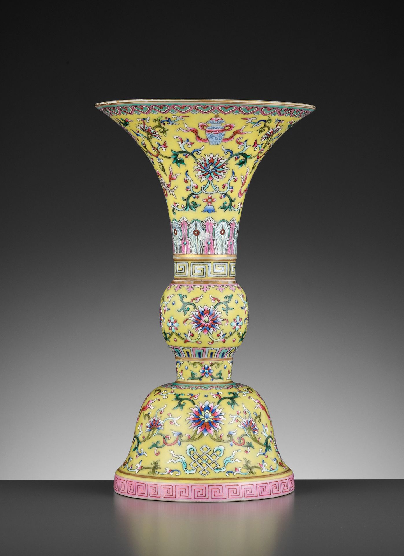 A FAMILLE-ROSE YELLOW-GROUND ‘BAJIXIANG’ ALTAR VASE, GU, LATE QING TO REPUBLIC A&hellip;