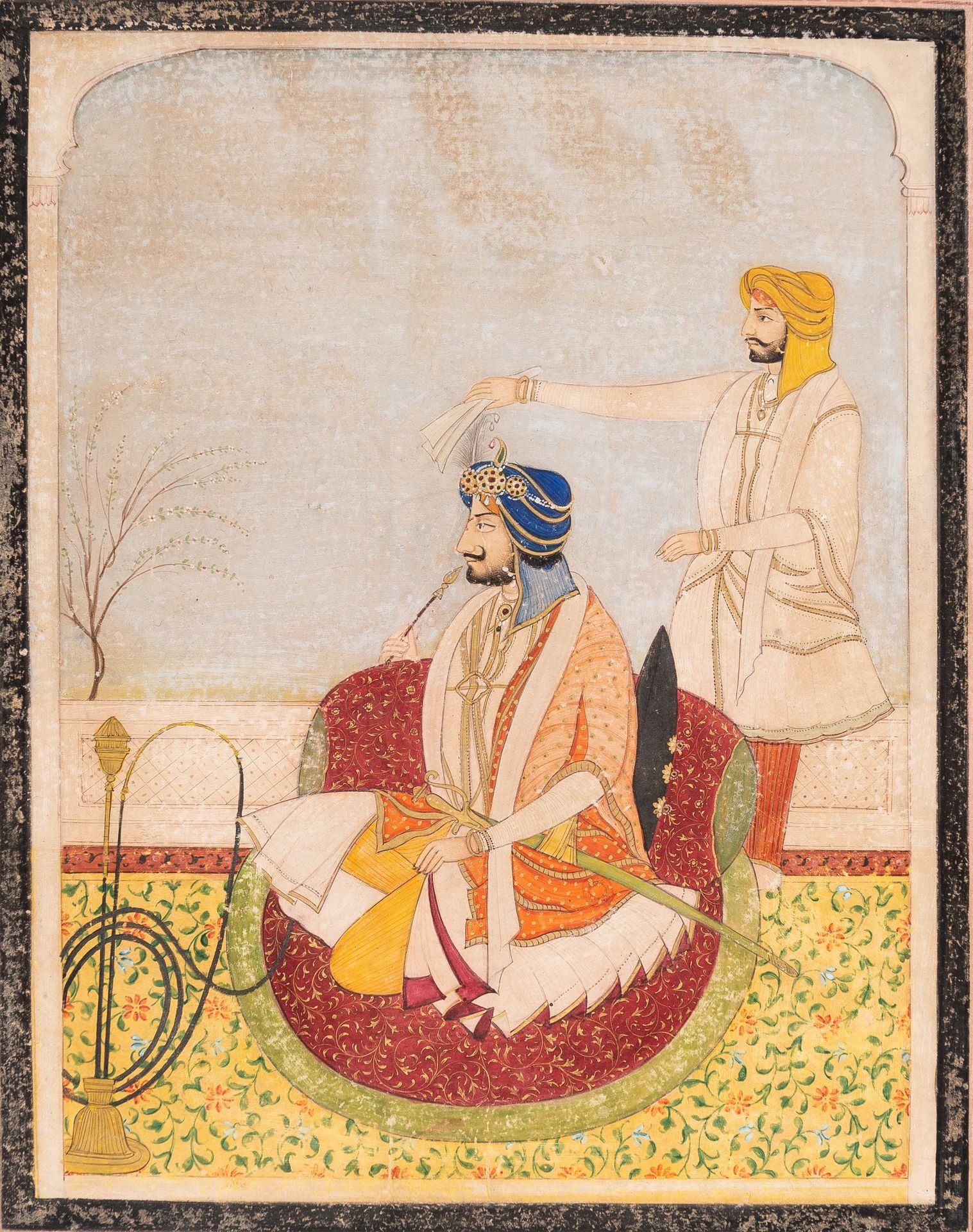 AN INDIAN MINIATURE PAINTING OF A RULER SMOKING A HUQQA 一幅印度迷你画，画的是一个统治者在吸食HUQQA&hellip;
