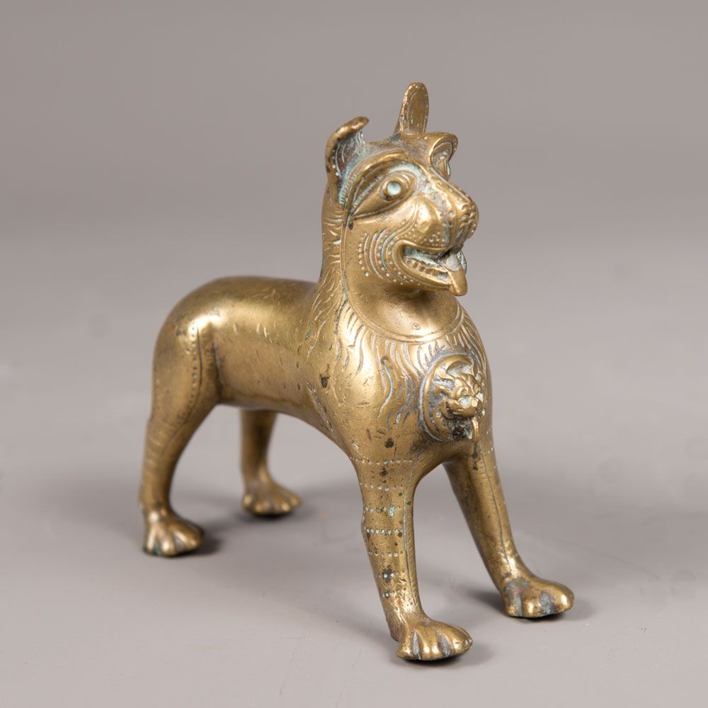 A bronze aquamanile A bronze Aquamanile, in shape of a beast, engraved and polis&hellip;