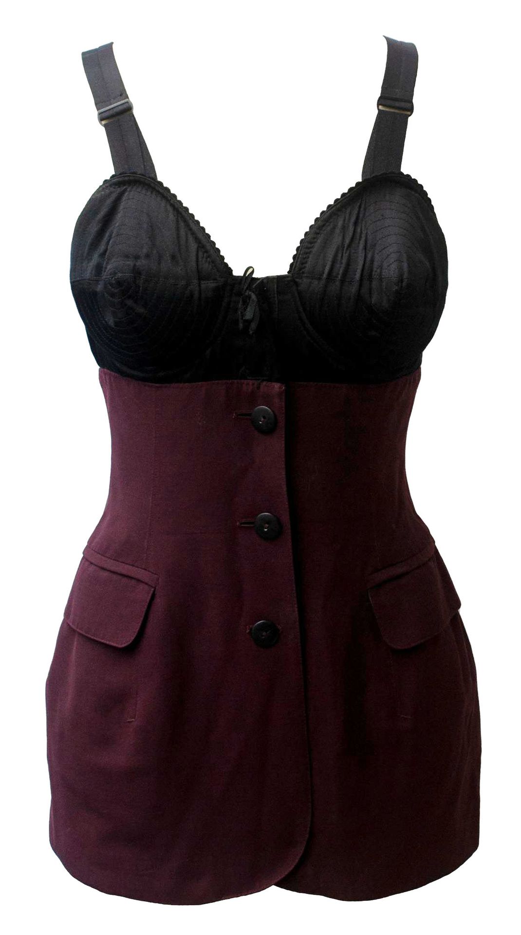 Null Jean Paul Gaultier

毛衣外套



描述。

茄子色的丝绸用于这件上衣，夹克的经典剪裁细节与被称为 "锥形胸罩 "的绗缝内衣混合。&hellip;