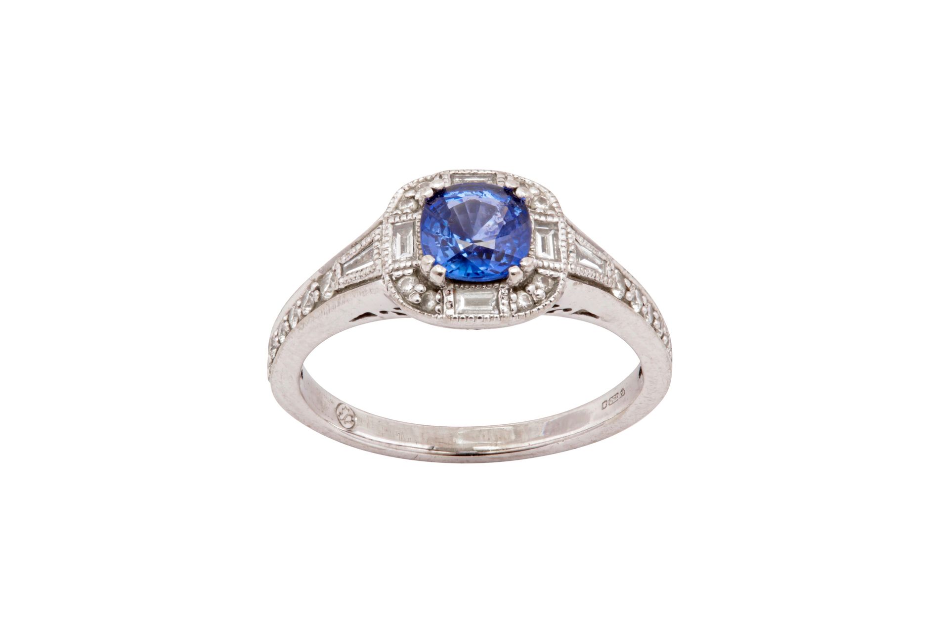 A Sapphire and Diamond Ring A sapphire and diamond ring The cushion-cut sapphire&hellip;