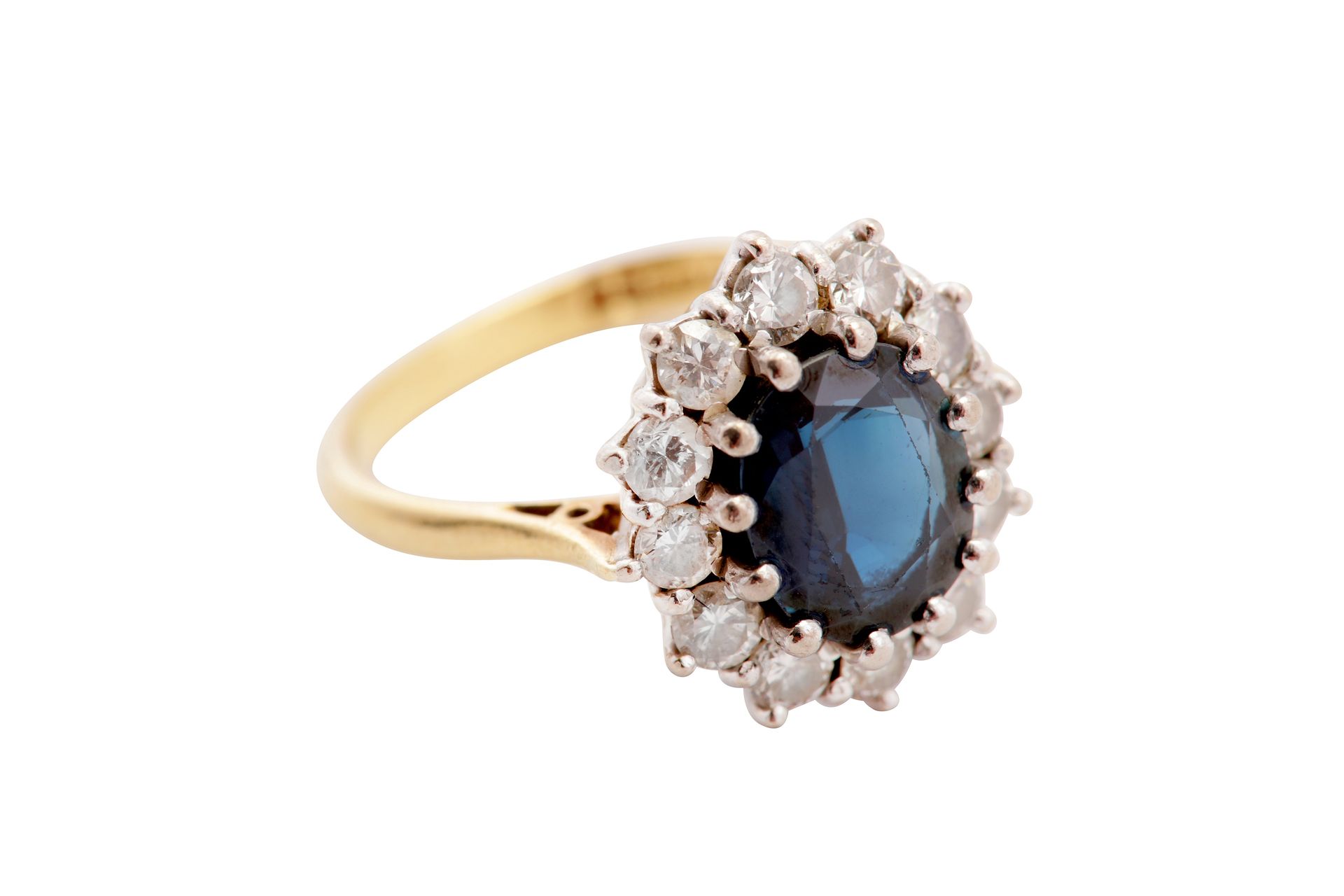 A sapphire and diamond cluster ring A sapphire and diamond cluster ring The oval&hellip;