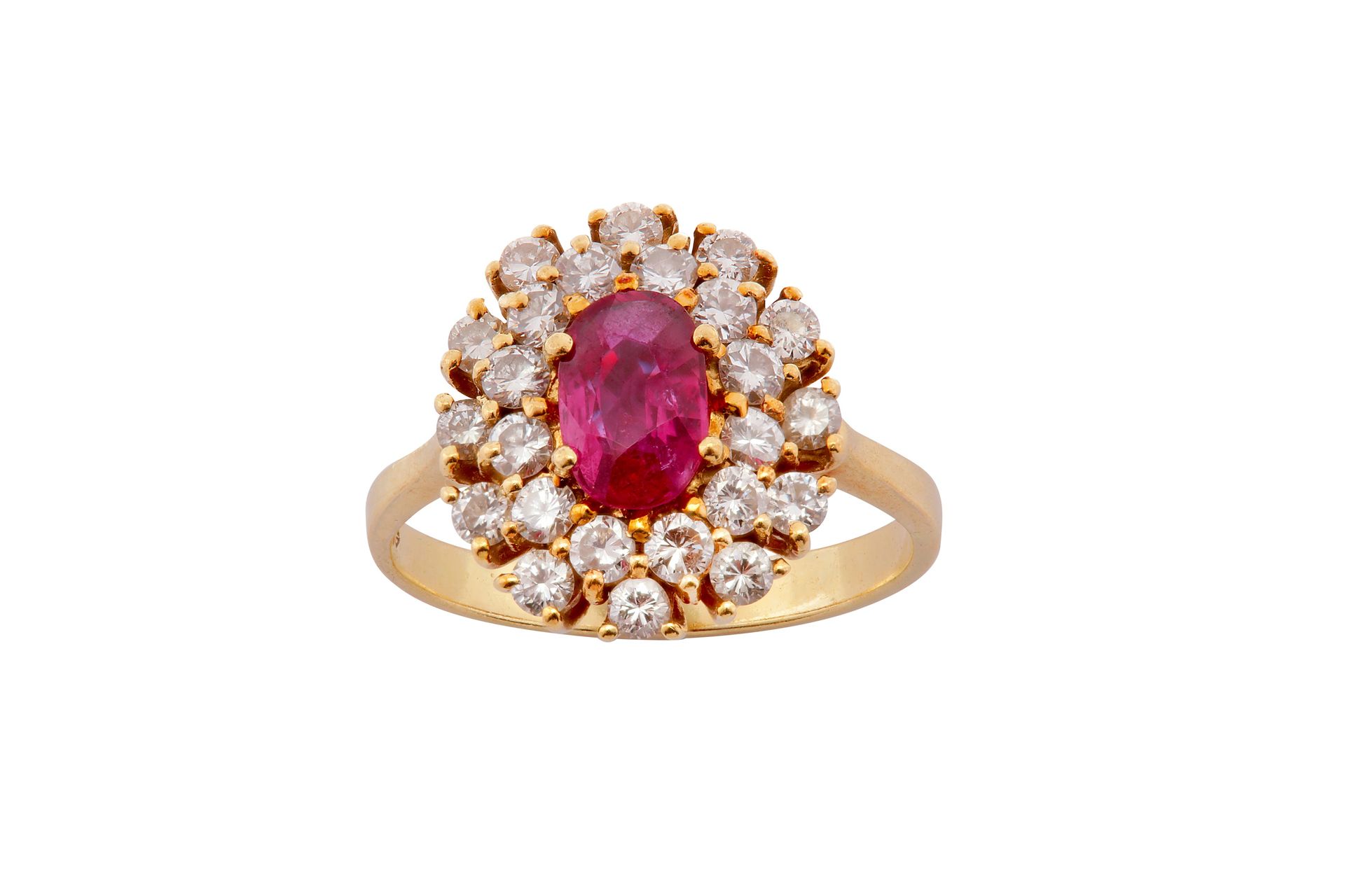 A ruby and diamond cluster ring A ruby and diamond cluster ring The oval-cut rub&hellip;