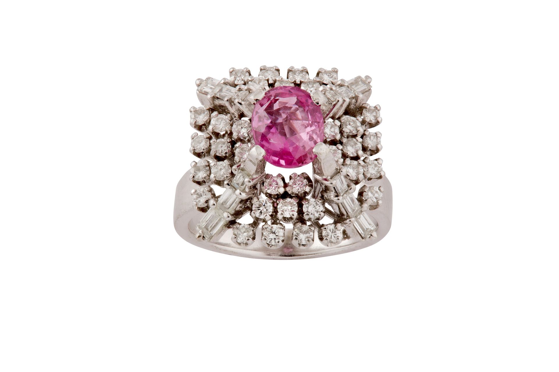 A pink sapphire and diamond dress ring A pink sapphire and diamond dress ring Th&hellip;