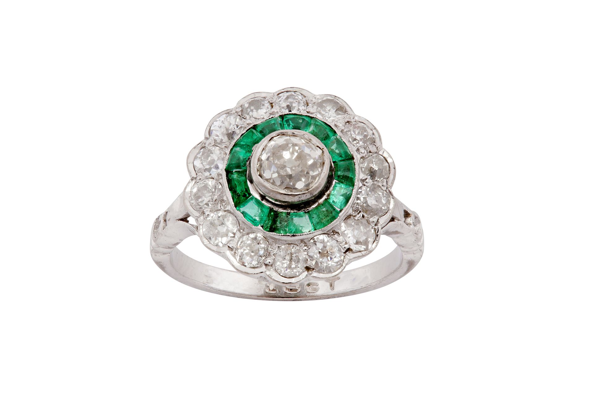 A diamond and emerald cluster ring A diamond and emerald cluster ring Designed a&hellip;