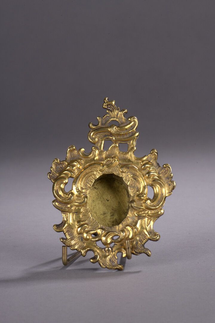 Null Gilt bronze miniature frame, mid 18th century

3,5 x 2,5 cm