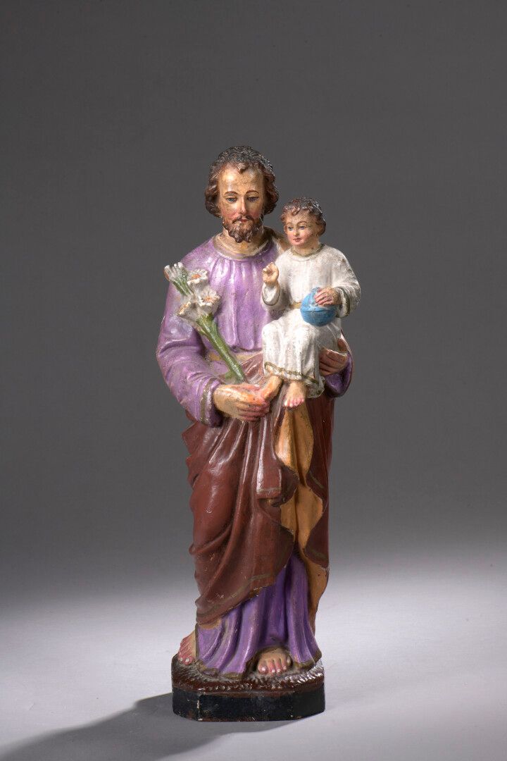 Null 法国学校，19世纪

圣约瑟夫携带儿童耶稣

在多色赤土中。

H.48厘米