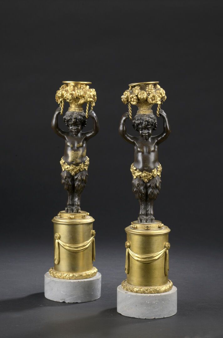 Null Paire de flambeaux en bronze patiné et doré d'époque Louis XVI

Décor d'un &hellip;