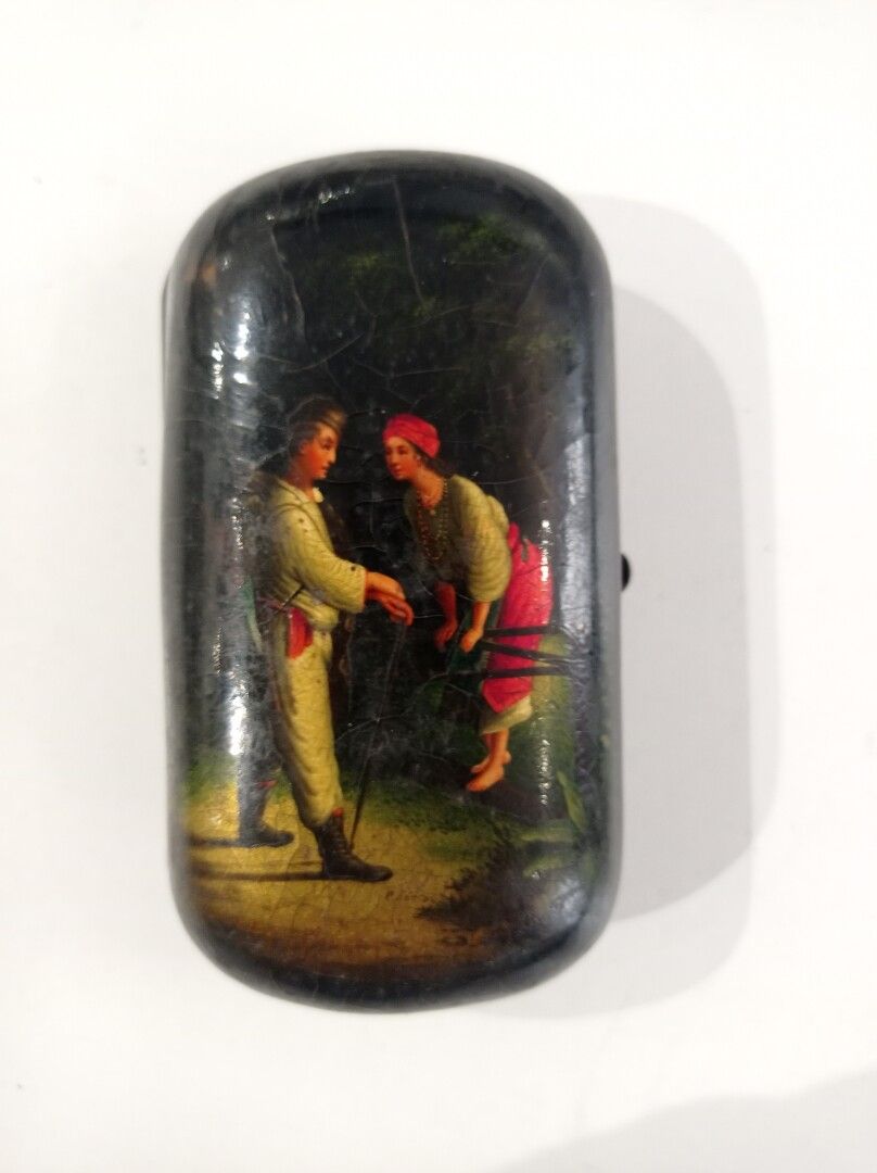 Null Polychrome lacquered paper mache box with a soldier and a peasant woman.
Ru&hellip;
