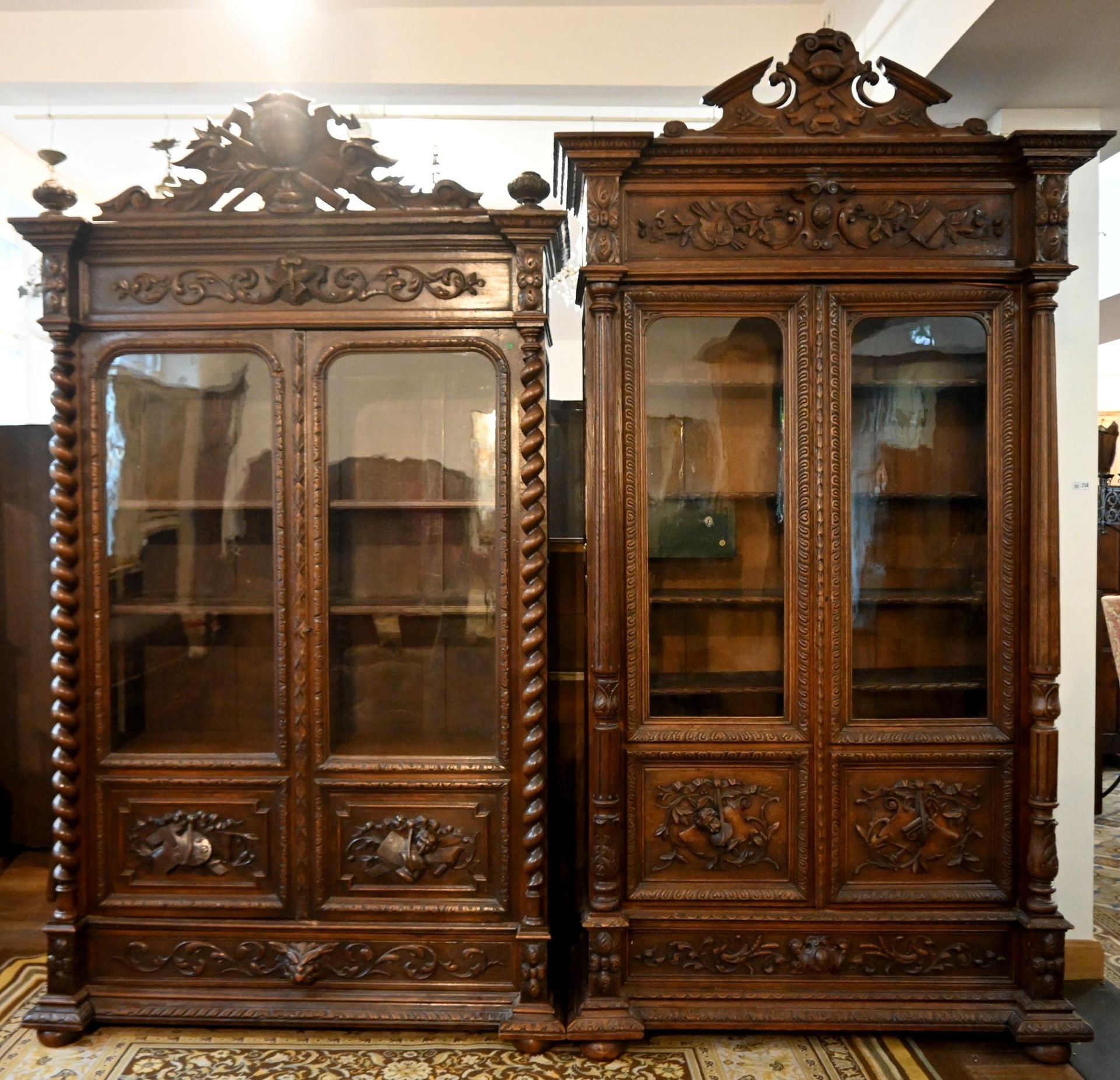 Null Reunion of (x2) straight bookcases, glazed, with pediments, in carved natur&hellip;