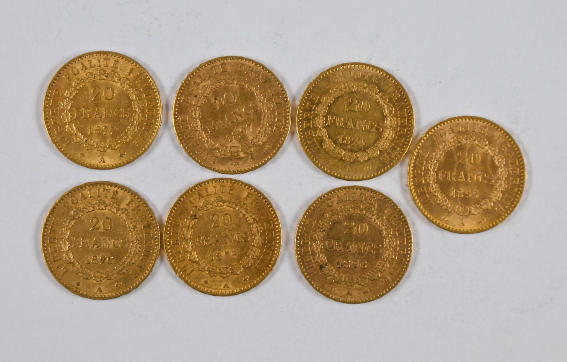 Null Lote de (x7) monedas de oro de 20FF con las tablas de la ley, 1876, 1874, 1&hellip;