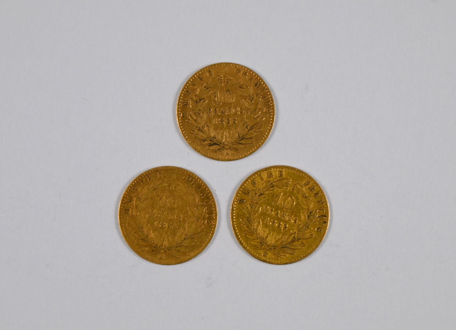 Null Lote de (x3) monedas de oro de 10FF Napoleón III, cabeza, 1863, 1864 y 1862&hellip;