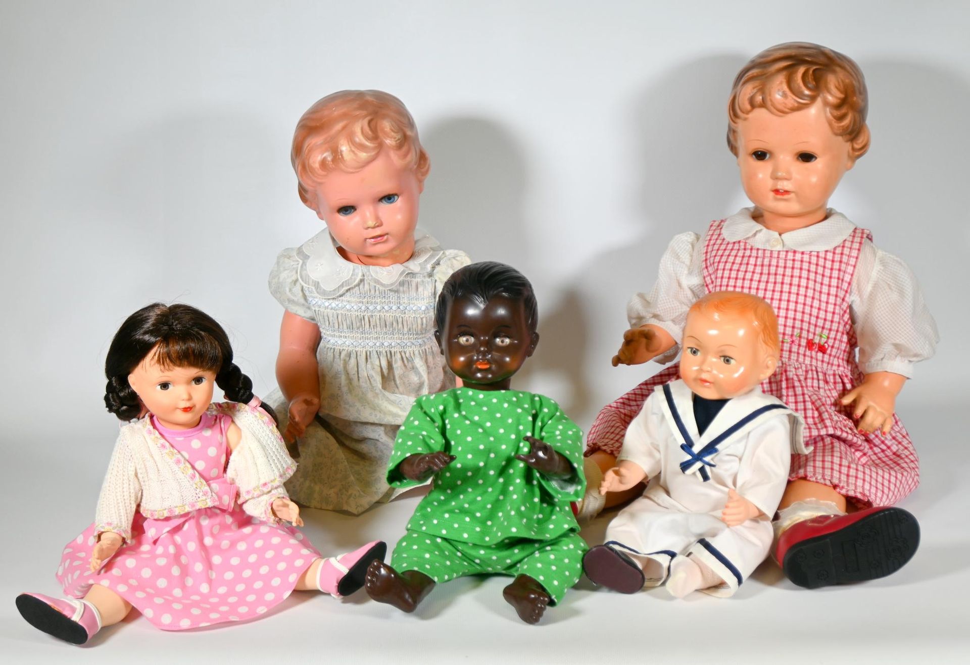 Null Set of celluloid dolls circa 1960-1970 including: (x2) "Petitcollin" dolls &hellip;