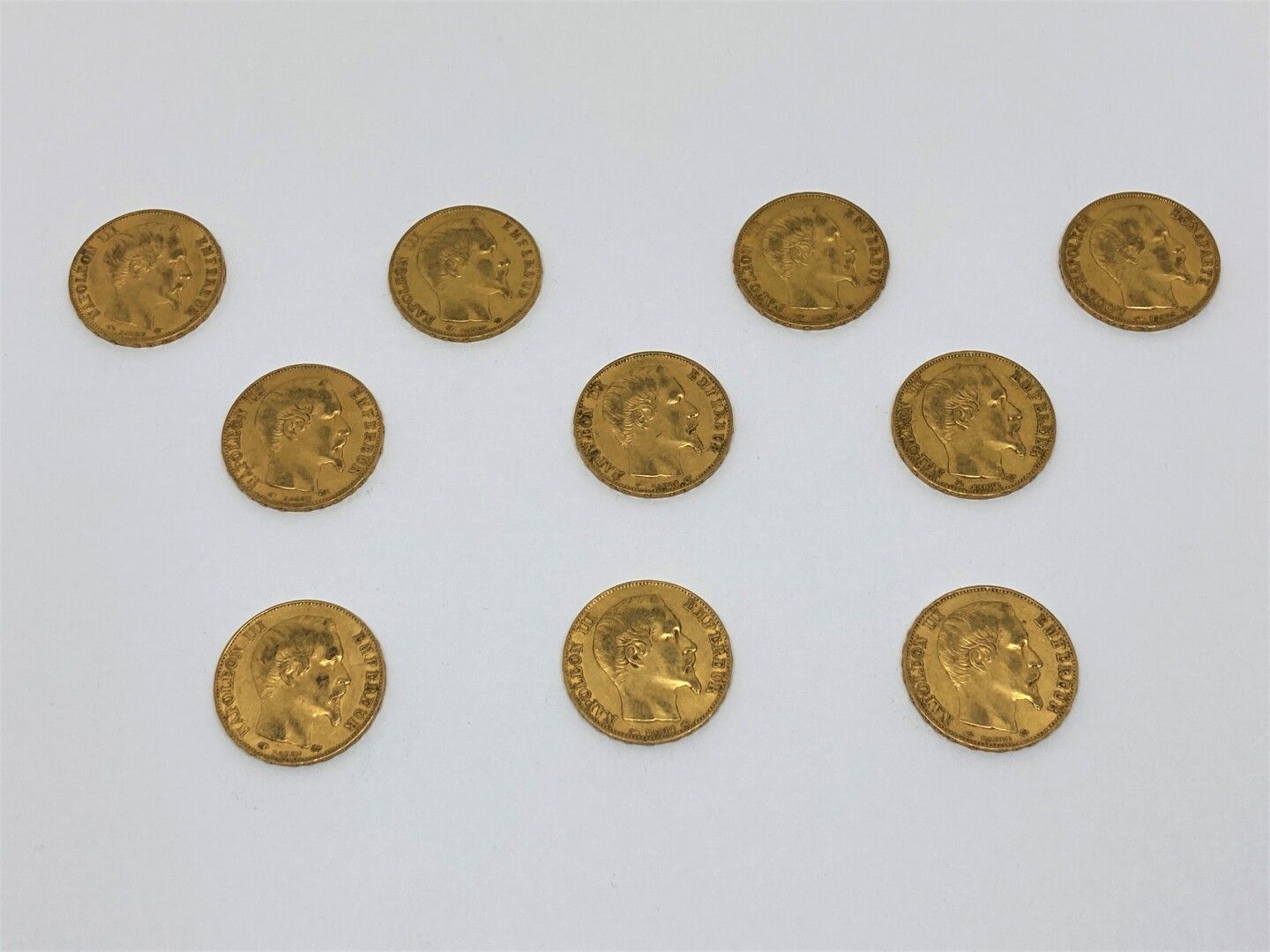 Null 10 monete da 20 franchi oro NAPOLEONE III BARRE :

- 2 di 1859 A

- 2 di 18&hellip;